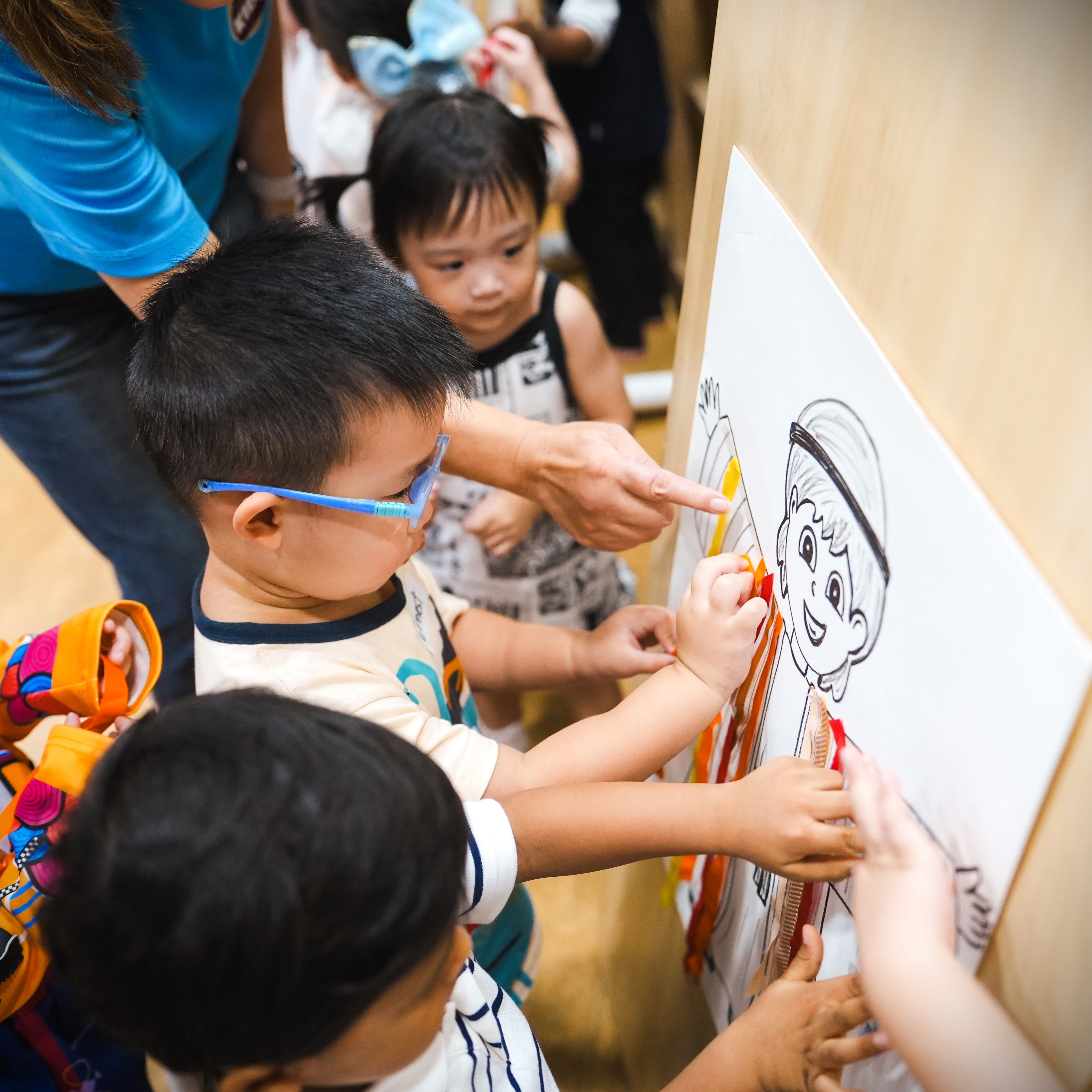 The children were immersed in a special lesson about a father's love through the story of Jacob's gift of the richly ornamented robe to Joseph - a beautiful reminder of a father's affection and blessings